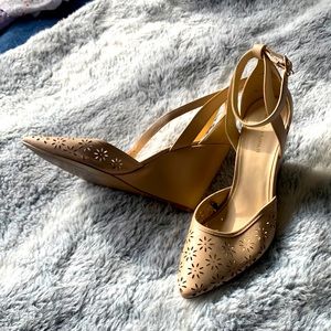 Nude closed toe wedges